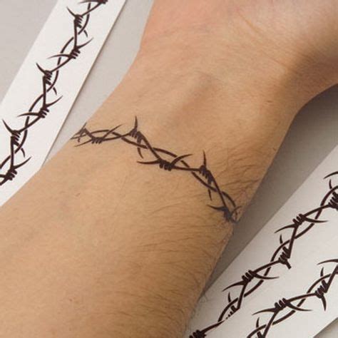 Stunning Tribal Wrist Tattoo Stunning Tribal Wrist Tattoo In Wire