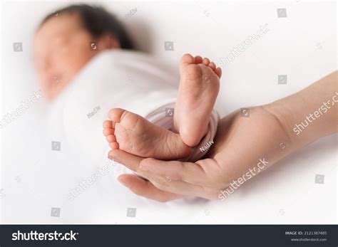 Womens Hand Hold Babys Legs Stock Photo Shutterstock