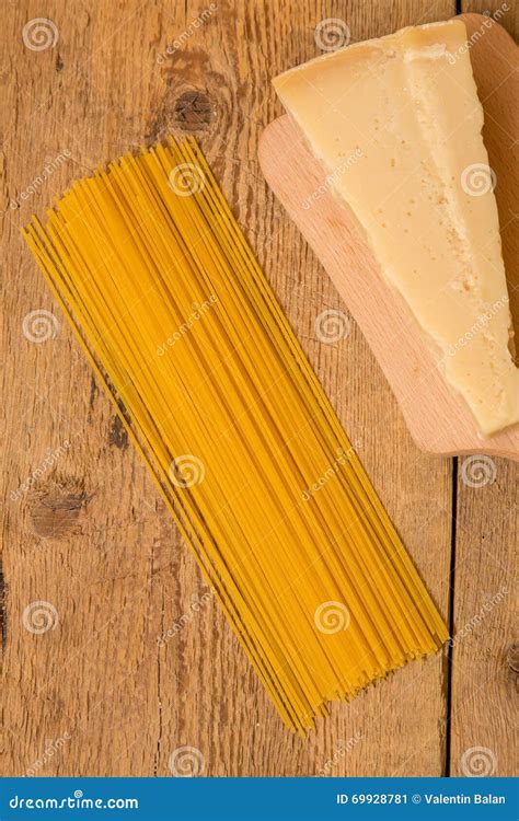 Parmesan Cheese and pasta stock image. Image of parmigiano - 69928781