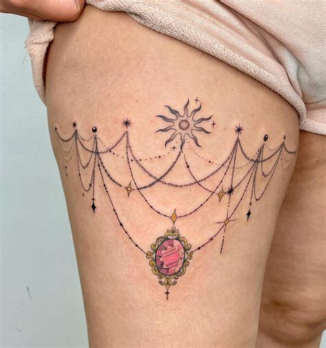 Ornamental Pendant Thigh Tattoo Thefab S