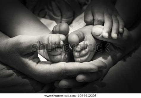 Mothers Hands Hold Baby Leg Stock Photo Shutterstock