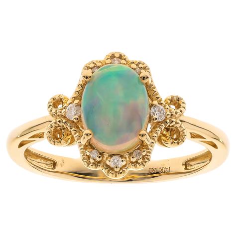 4 38 Carat Ethiopian Opal Oval Cab Diamond Accents 14K Yellow Gold Ring