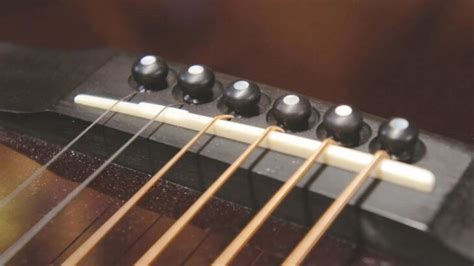 Guitar Saddle Vs Bridge Key Difference Common Types