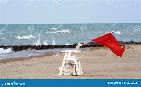 Red Flag Warning at the Beach Stock Image - Image of beach, lake: 283391505