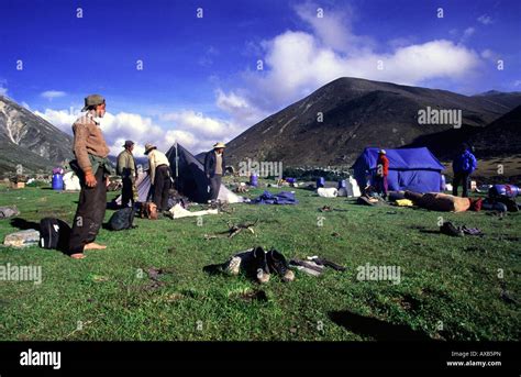 In Late Afternoon Yak Drivers Put Up Their Tent And Prepare The Fire To