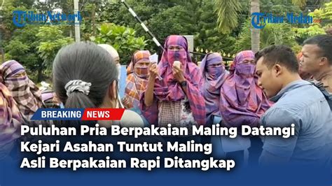 Puluhan Pria Berpakaian Maling Datangi Kejari Asahan Tuntut Maling