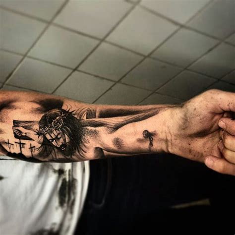 Pirate Ship And Cross Tattoo On Mans Arm