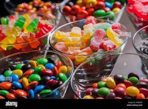 Colorful Mixed Candies In Small Clear Glass Bowls Stock Photo Alamy