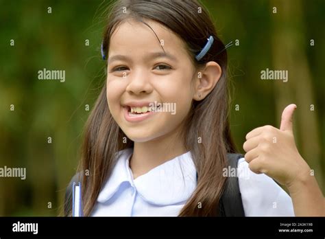 Pretty Diverse Girl Student And Happiness With Books Stock Photo Alamy