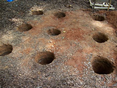 holes holes dug   main playset tower phew   flickr