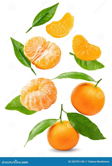 Flying Mandarins With Green Leaves And Slices Isolated On White