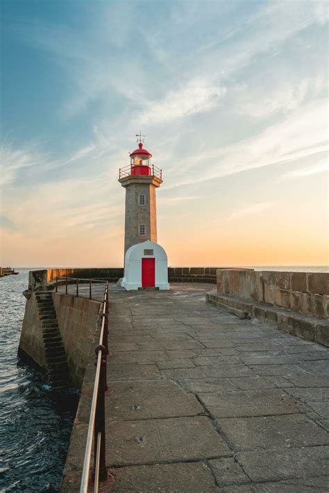 Farolim De Felgueiras Lighthouse With Sunset Porto Portugal Juli