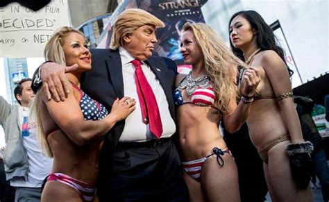 Bikini Clad Models Surround Fake Donald Trump In New York City Stunt