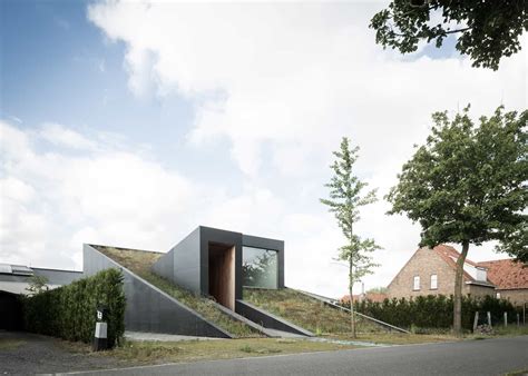 Sloped Green Roof Covers Split Level Home