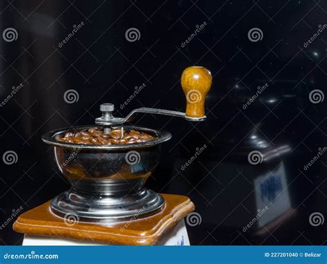 Retro Coffee Grinder Is Ready To Start On A Table Stock Photo Image