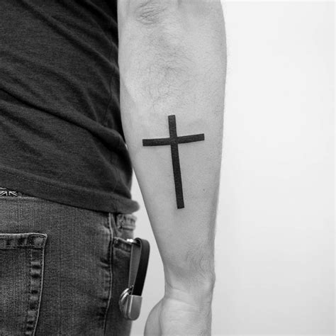 Minimalistic Cross Tattoo Done On The Forearm