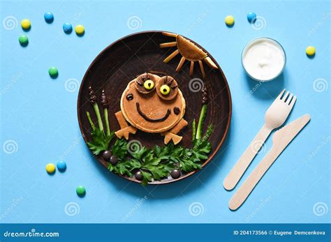 Funny Frog Made Of Pancakes On A Plate Top View Breakfast For