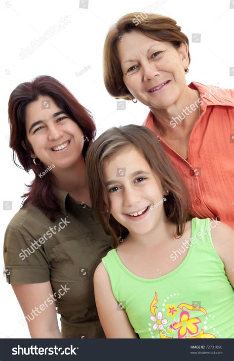 Three Generations Of Women Isolated On A White Background Stock Photo