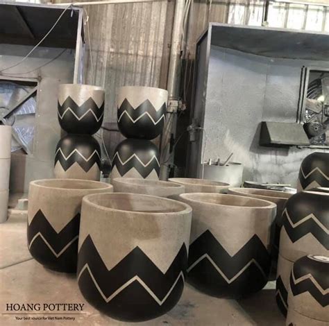 GEOMETRIC PATTERN PAINTED CEMENT PLANTERS CREATE ATTRACTIVE AND MODERN VIEWS IN INDOOR AND ...