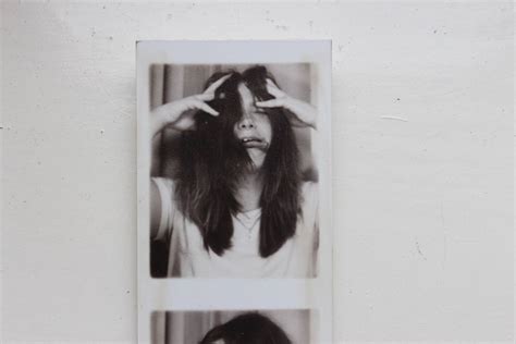 Two Pictures Of A Woman Holding Her Hair In Front Of Her Face With Both