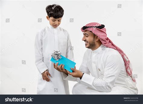 Father Giving Gift His Son Stock Photo (Edit Now) 324916748