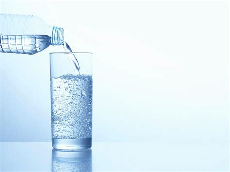 Pouring Water In Glass Photograph By Science Photo Library