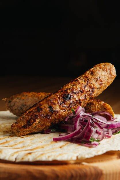 Premium Photo Lula Kebab With Pita Bread And Onion