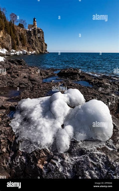 Ice Left By Water Splashed Up From Waves Below Split Rock Lighthouse On Lake Superior Minnesota