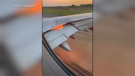 Scary Passengers Panic As Flames Pour Out Of Wing On American Airlines