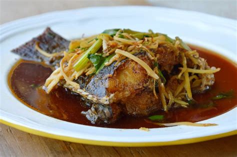 Deep Fried Mango Fish In Ginger Soy Sauce On Dish Stock Photo Image