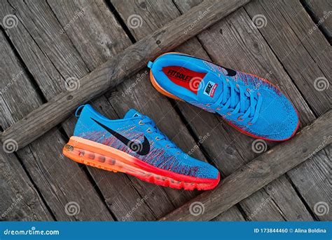 Colorful Nike Flyknit Air Max Running Shoes Sneakers On Wooden