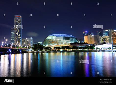 Singapore skyline night Stock Photo - Alamy