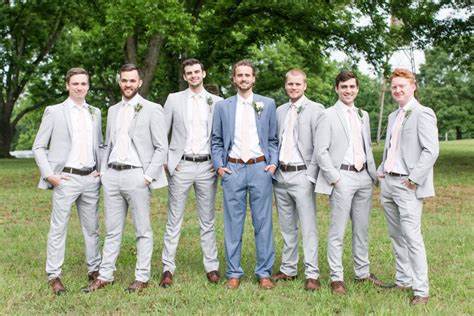 Grooms Blue Suit And Groomsmen In Gray Suits Groom S Different Suit