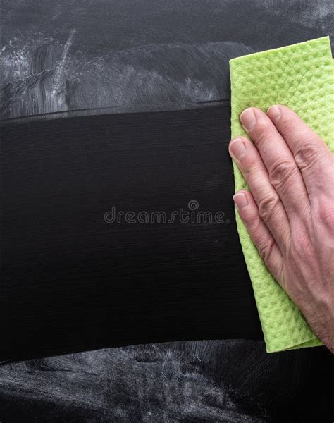 Person Cleaning Dirty Chalkboard With Sponge Cloth Stock Photo Image