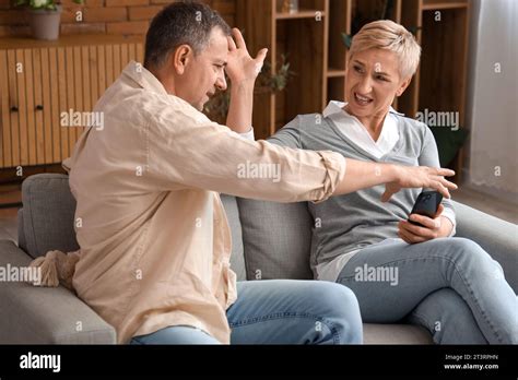 Mature Woman Angry Husband Phone Hi Res Stock Photography And Images Alamy