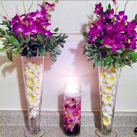 Tall Purple Orchid And Plumeria Centerpieces Floating Candle Wedding