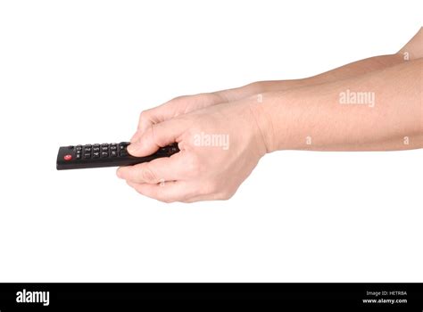 Hand Holding Remote Control To The TV Isolated With Path Stock Photo