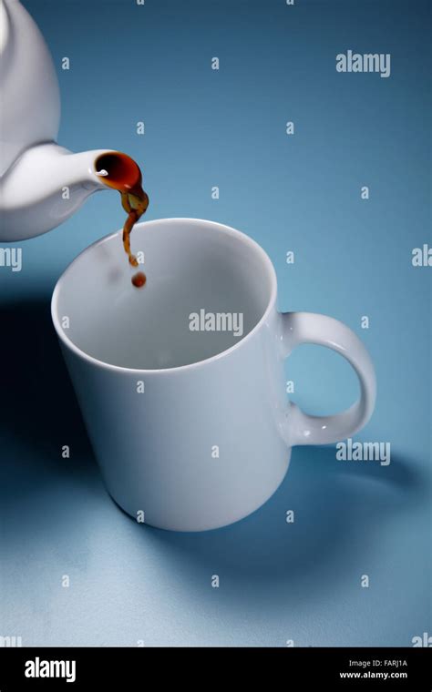 Stock Image Of Pouring Hot Drink To The Mug Stock Photo Alamy