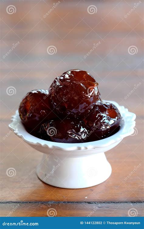 Sweet Jujube Or Chinese Red Date In Syrup In White Thai Style Cup On