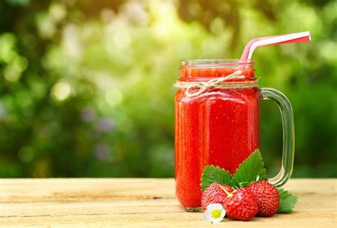 Premium Photo Strawberry Smoothie In Mason Jar Outdoors