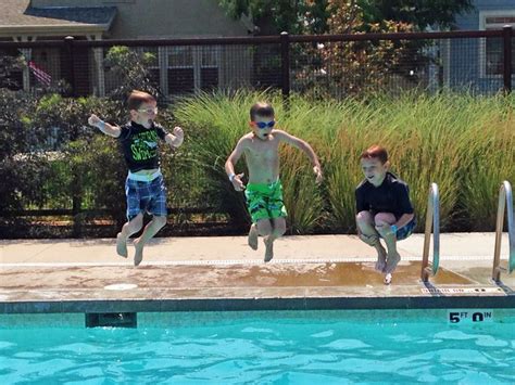 Cannon Balls Into The Eastlake Pool Are A Staple Of Summer Life Photo