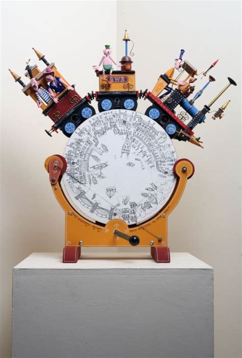 A Clock With Many Toy Figures On Top Of It