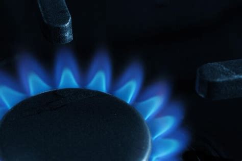 Premium Photo Close Up Of The Blue Flame Of Burning Natural Gas Ring