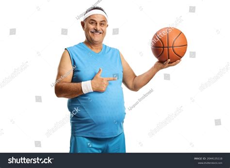 Happy Mature Man Holding Basketball Pointing Stock Photo 2044135118