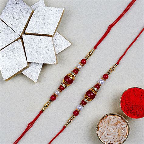 Red Pearl Thread Rakhi With Kaju Katli Box Uae Gift Red Pearl Thread