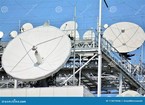 Satellite Communications Dishes On Top Of Tv Station Stock Photo