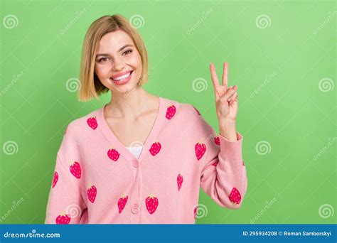 Photo Of Attractive Young Woman Showing V Sign Hello Wear Trendy Pink