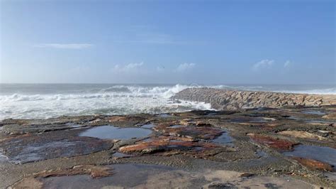 The Sea Rises To The Seafront Of Furadouro In Ovar Stock Photo Image