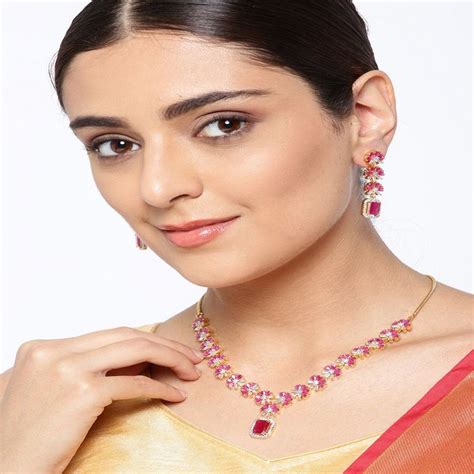 Priyaasi Gold Plated Ad And Ruby Studded Floral Pattern Jewellery Set