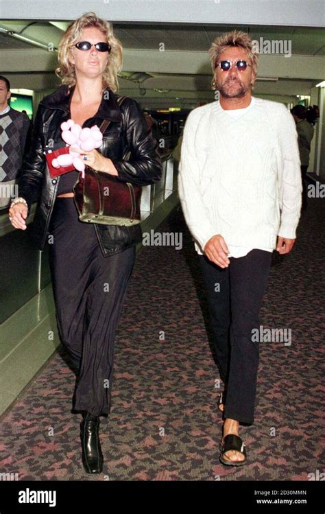 Rod Stewart And His Wife Rachel Hunter At Heathrow Airport Today Tuesday Before Leaving For